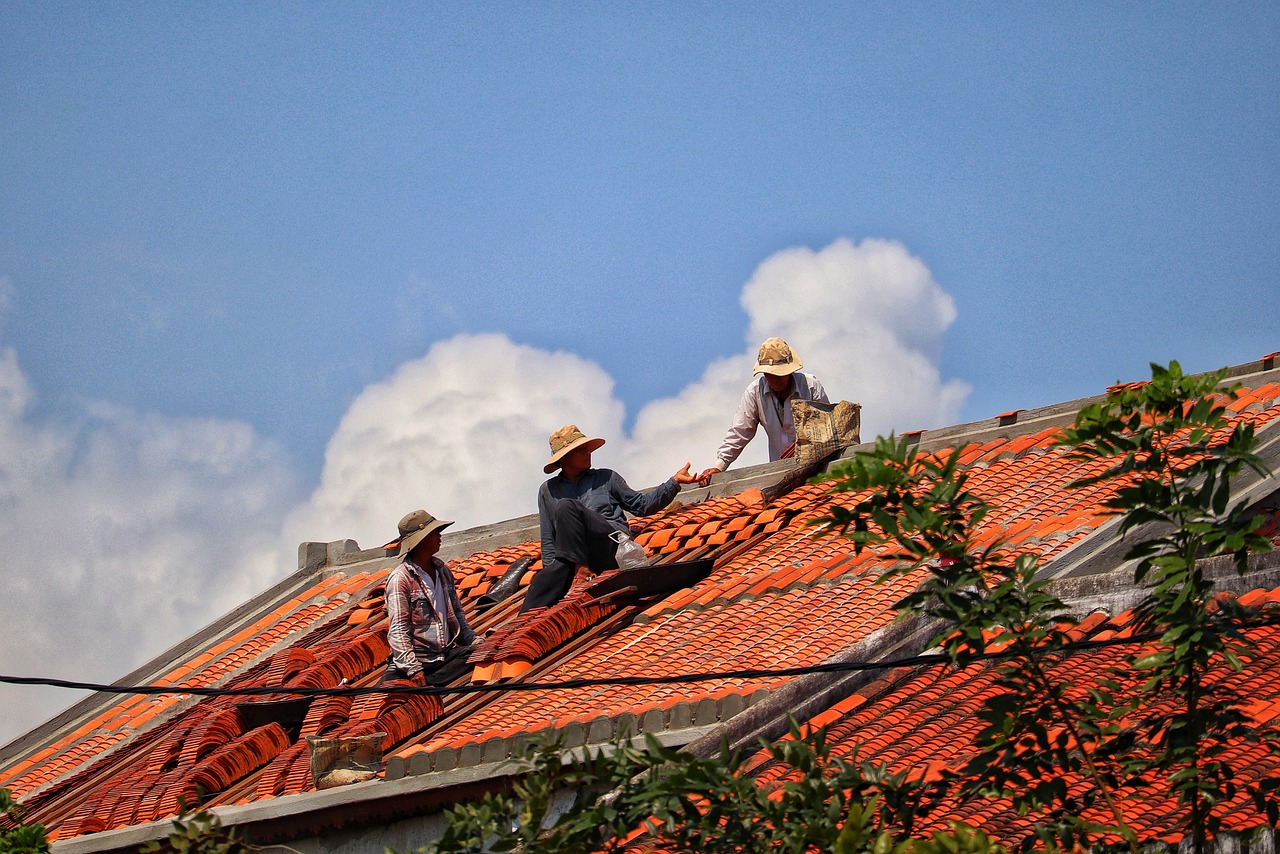 roofer using drone for roof inspection