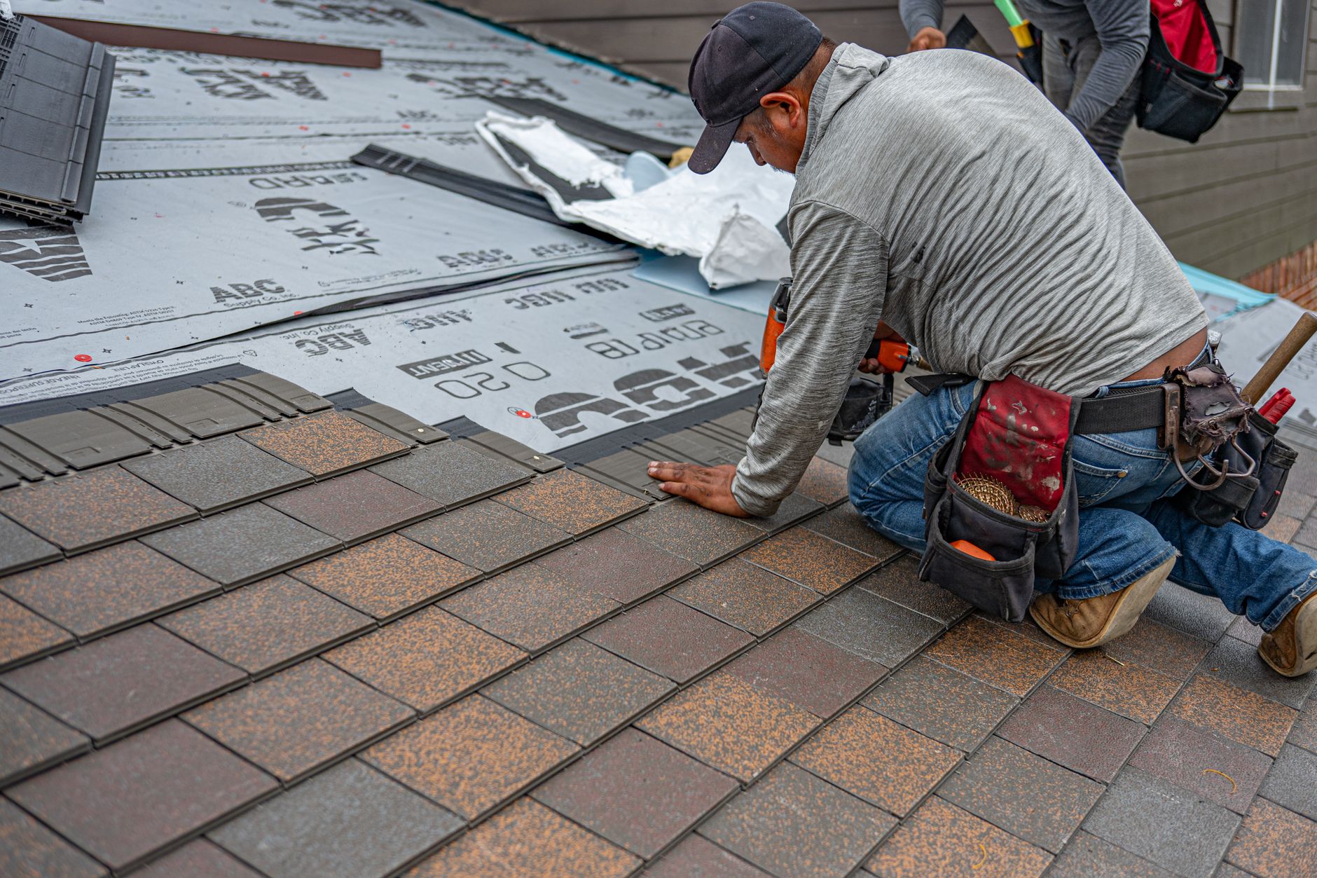 roofer inspecting Winnipeg residential roof